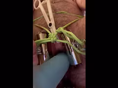 bdsm ftm trans boy uses ropes and clamps to make himself wet before getting stretched