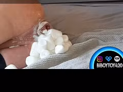 Huge anal insertion whit 24 marshmallows and creamy anal prolapse.