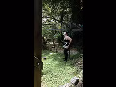 Sissy handcuffed to clothes line